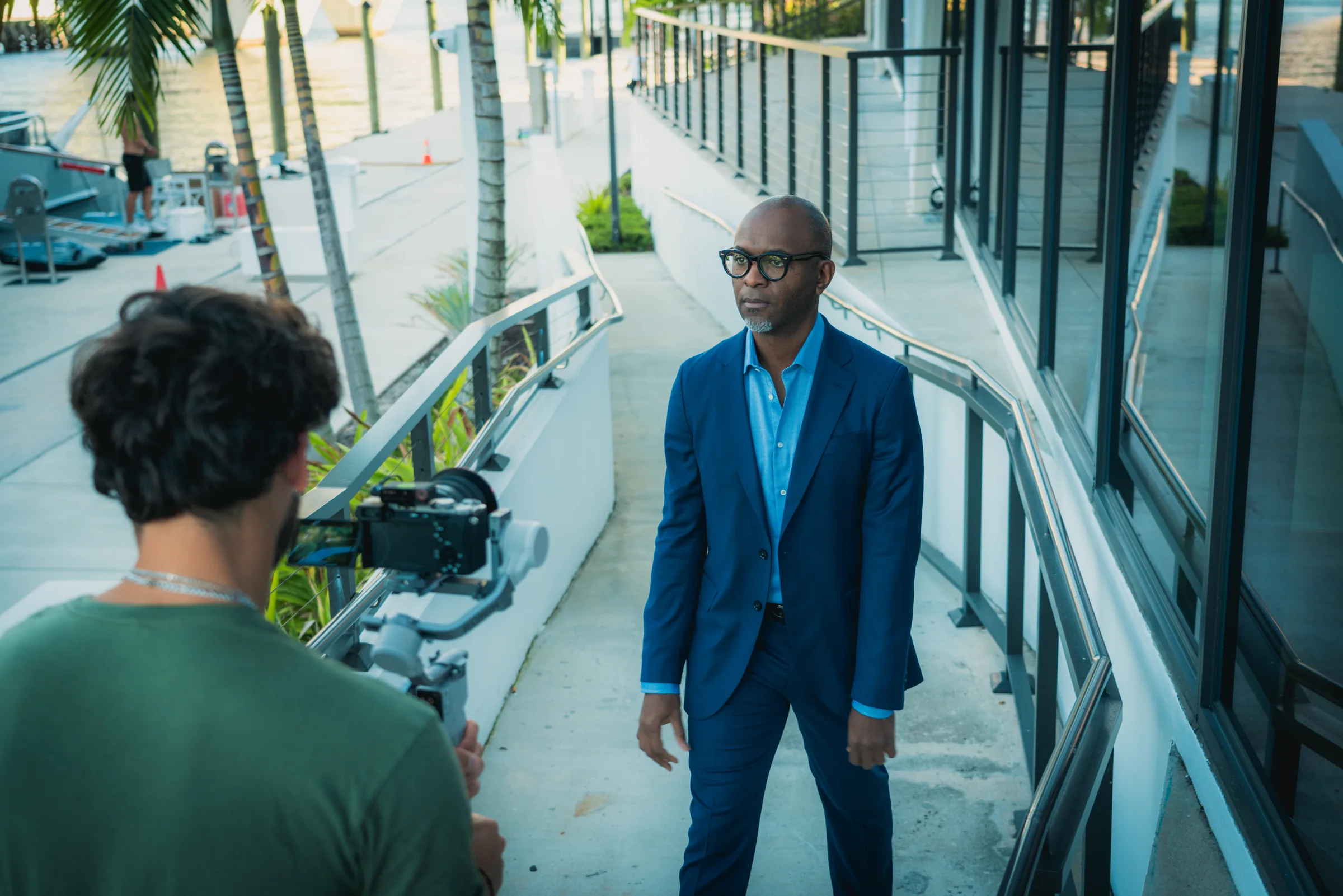 A camera operator filming Dr. Sammy Noumbissi